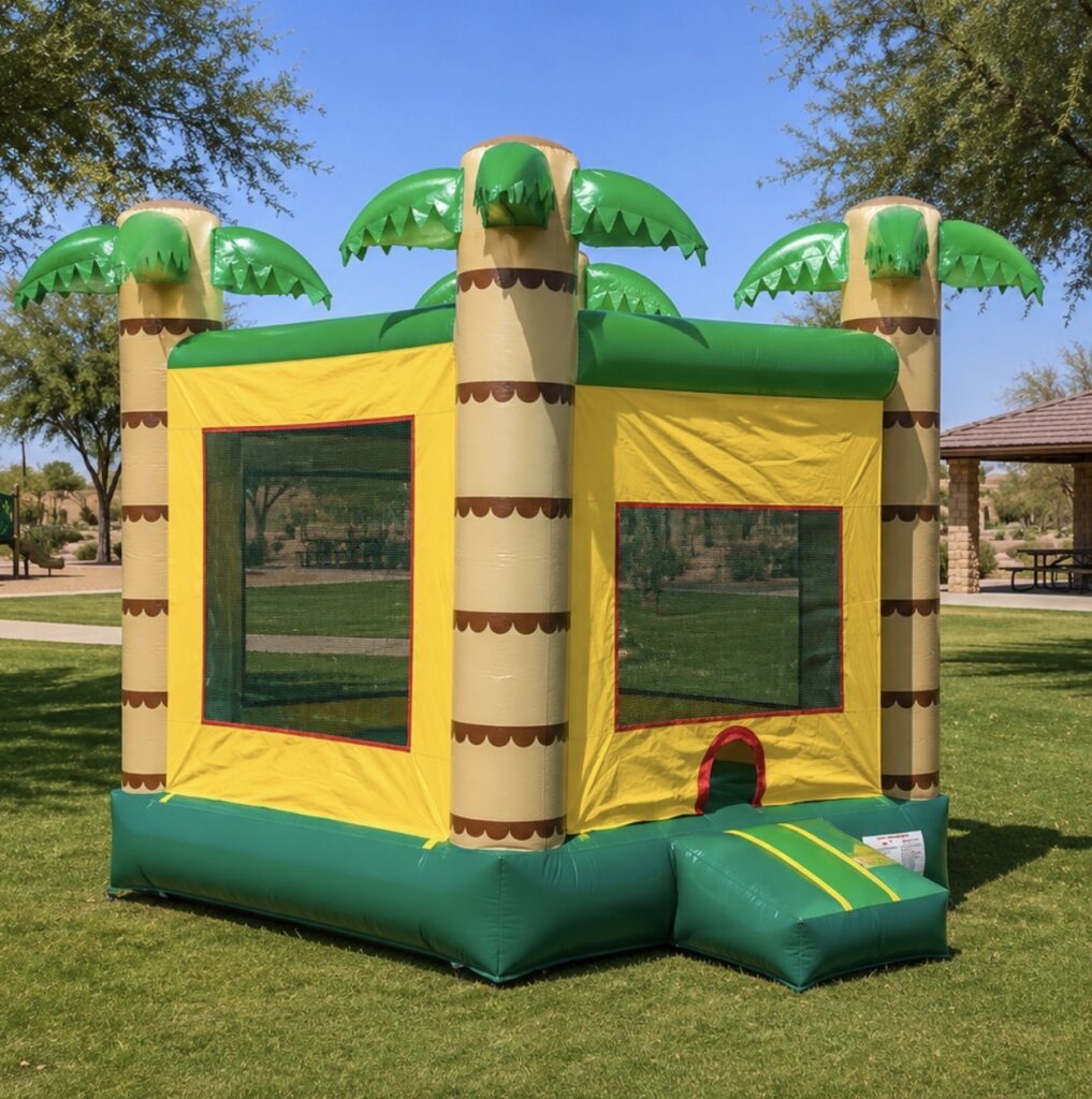 Tropical bounce house rental with palm-tree columns